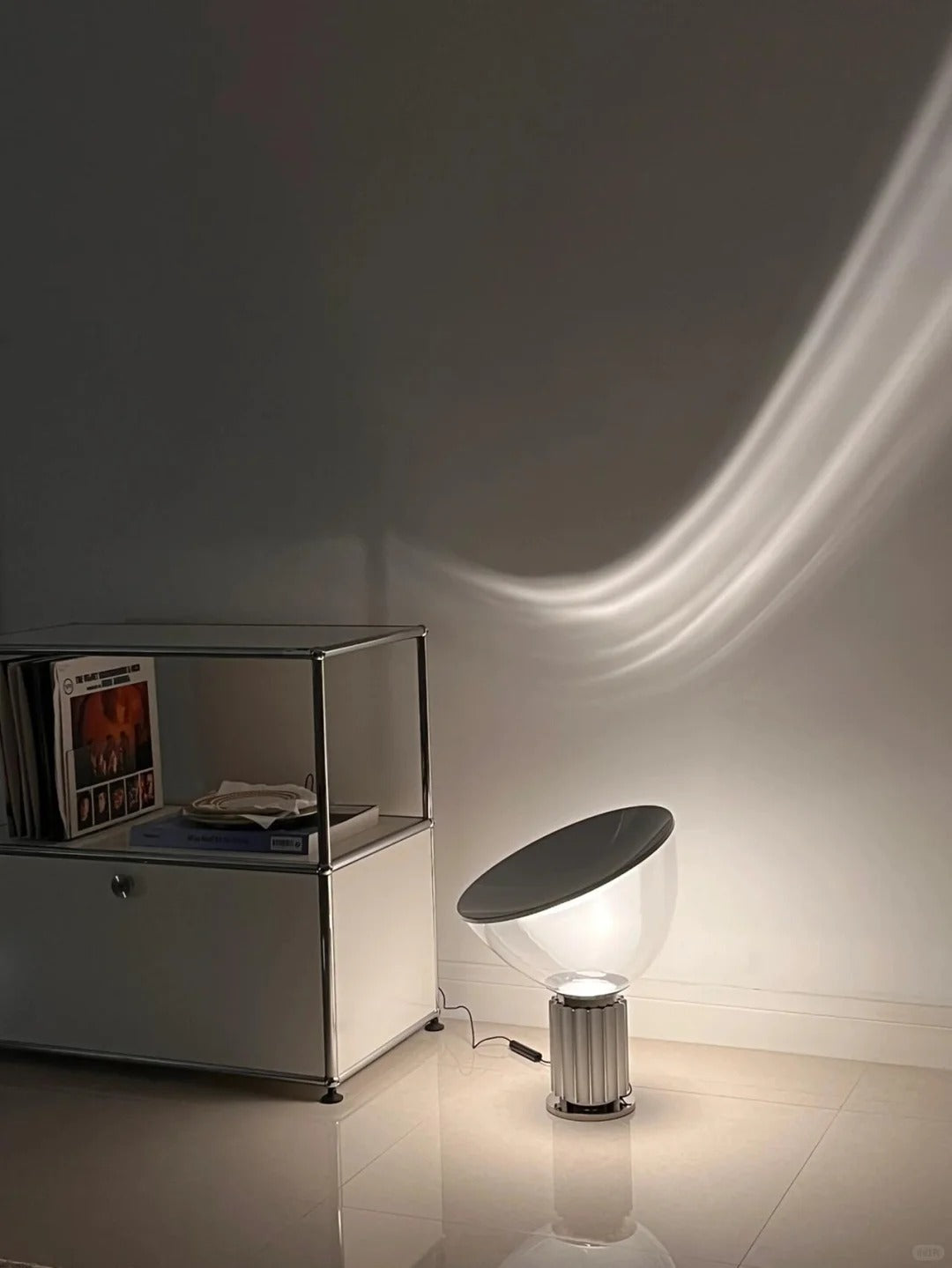 Taccia Table Lamp-Artworks That Define The Interplay Of Light And Shadow In Space