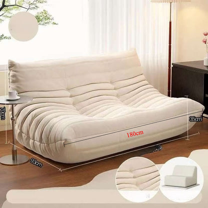 Sofá de pana estilo Togo: líneas suaves y comodidad relajada