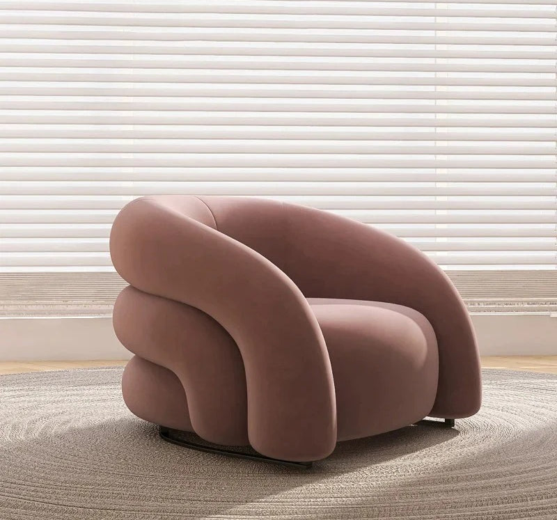 Sillón curvo de tela de diseño: un sofá elegante y cómodo 