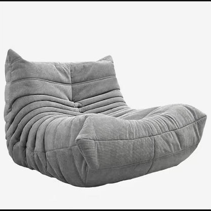 Sofá de pana estilo Togo: líneas suaves y comodidad relajada