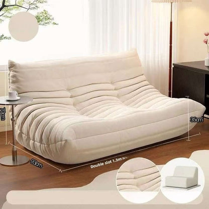 Sofá de pana estilo Togo: líneas suaves y comodidad relajada