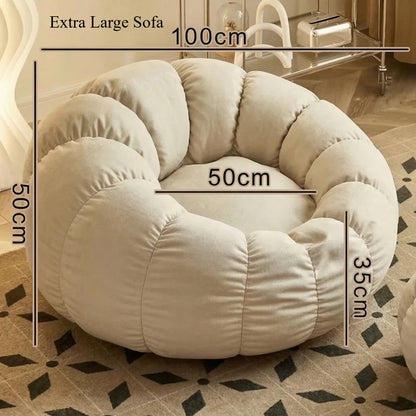 Pumpkin Bliss: sillón reclinable de suelo color crema para dormitorios y balcones acogedores