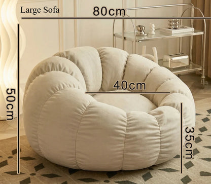 Pumpkin Bliss: sillón reclinable de suelo color crema para dormitorios y balcones acogedores