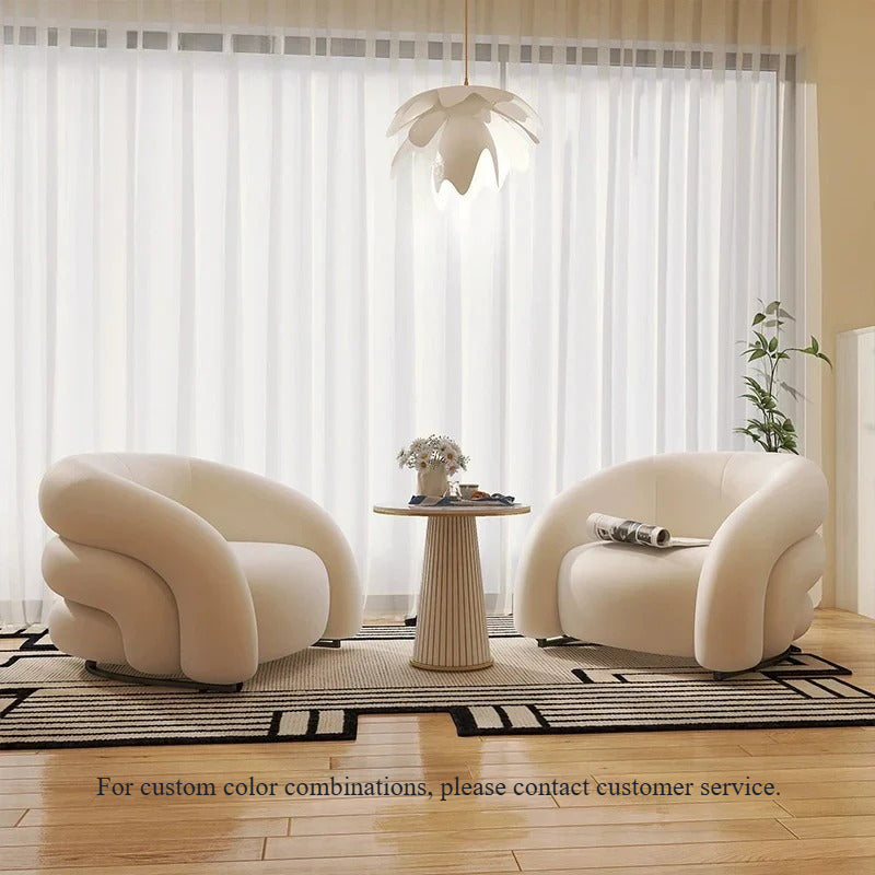 Sillón curvo de tela de diseño: un sofá elegante y cómodo 