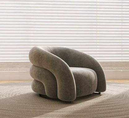 Sillón curvo de tela de diseño: un sofá elegante y cómodo 