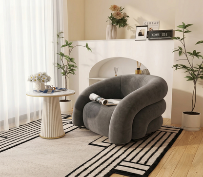 Sillón curvo de tela de diseño: un sofá elegante y cómodo 
