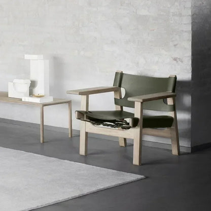 Timeless Allure – Spanish Hunting Rattan Lounge Chair