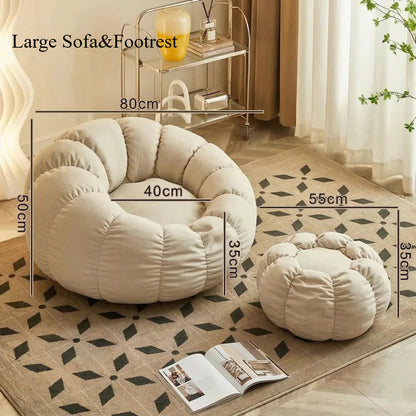 Pumpkin Bliss: sillón reclinable de suelo color crema para dormitorios y balcones acogedores