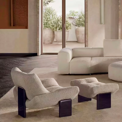 Cassina Emmi Armchair by Minotti – Modern Elegance & Curvaceous Design