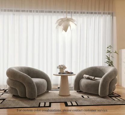 Sillón curvo de tela de diseño: un sofá elegante y cómodo 