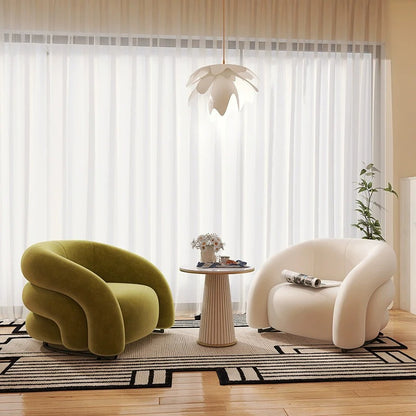 Sillón curvo de tela de diseño: un sofá elegante y cómodo 