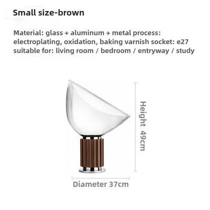 Taccia Table Lamp-Artworks That Define The Interplay Of Light And Shadow In Space