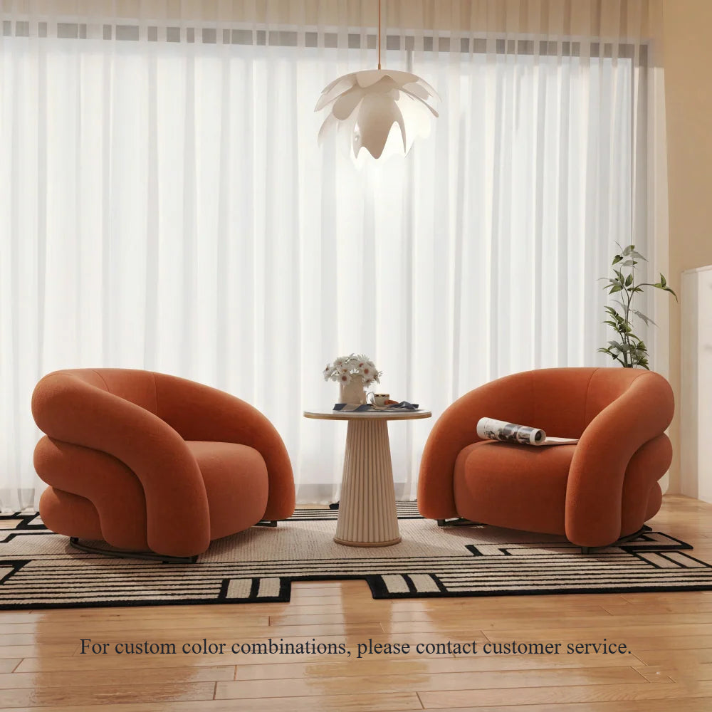 Sillón curvo de tela de diseño: un sofá elegante y cómodo 