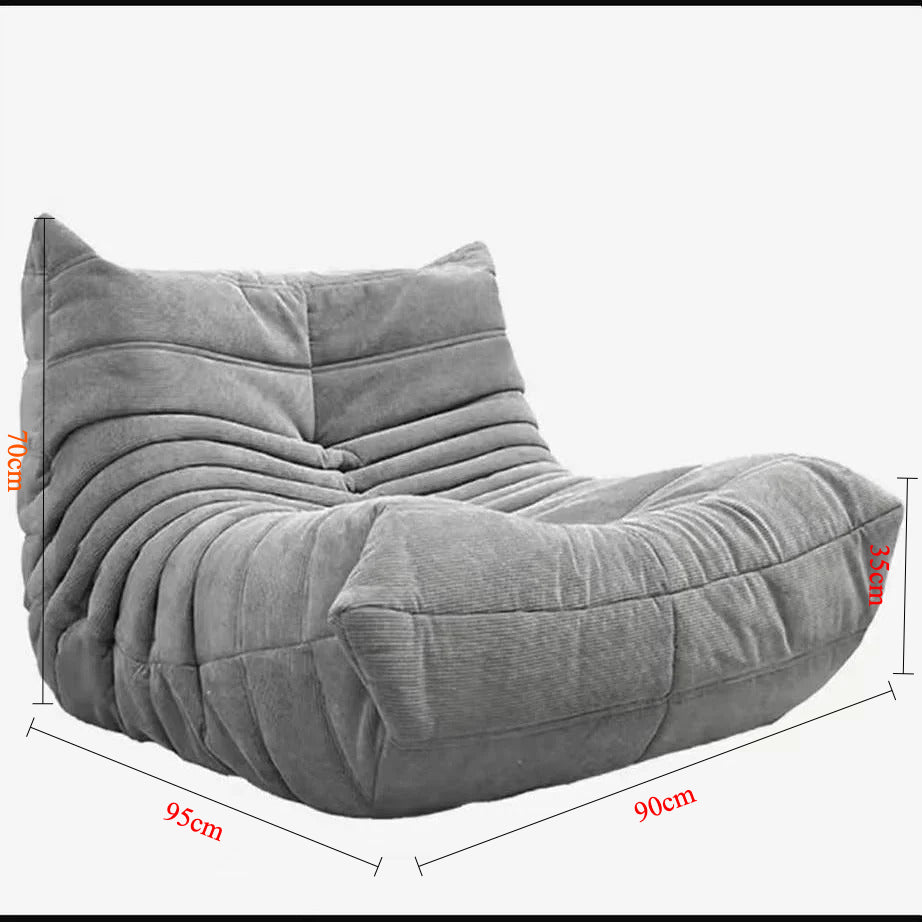 Sofá de pana estilo Togo: líneas suaves y comodidad relajada