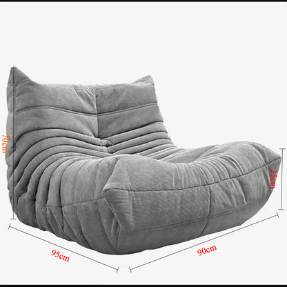 Sofá de pana estilo Togo: líneas suaves y comodidad relajada