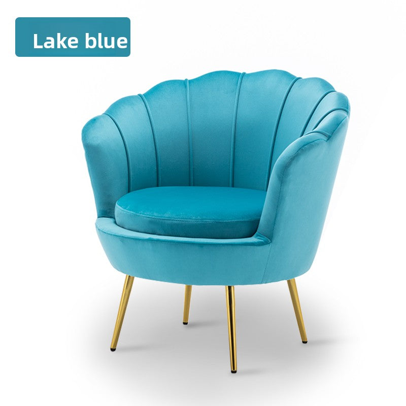 Lujoso sofá nórdico individual: moderno sillón minimalista para sala de estar, dormitorio y espacios boutique.